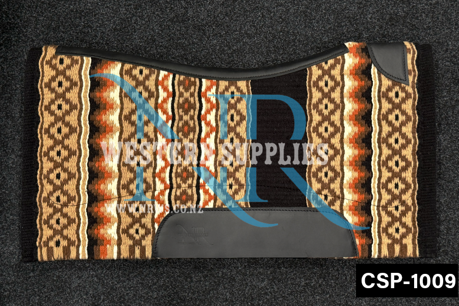 A contoured show saddle pad with geometric patterns in warm colors and black leather wear patches.
